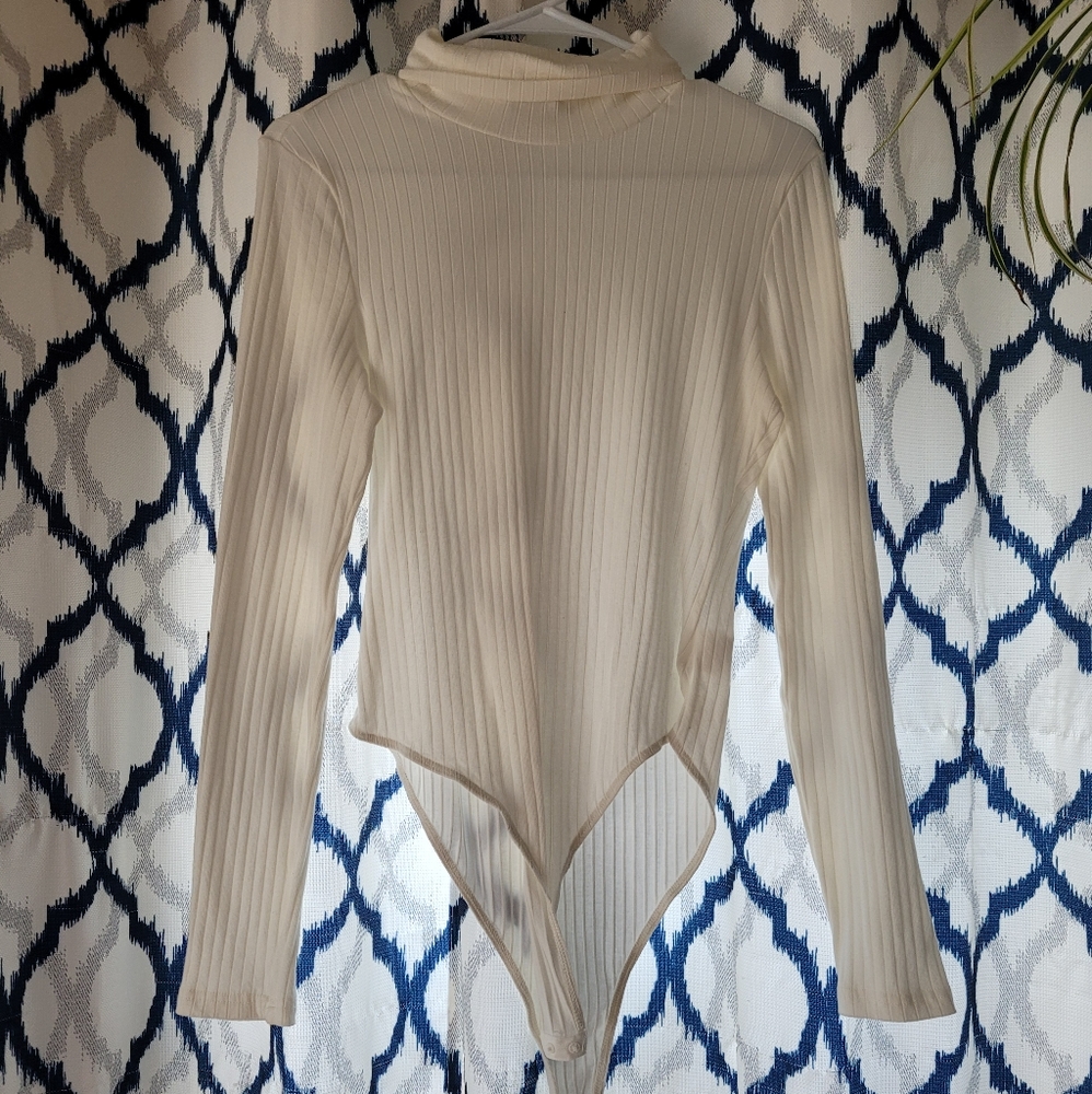 White long sleeve turtle neck bodysuit